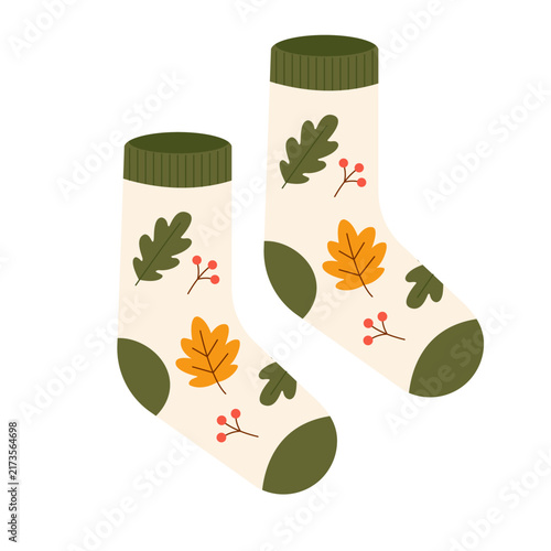 Autumn warm knitted socks with red berries and oak leaves