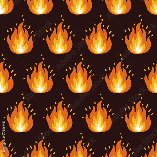 Seamless pattern with bright orange fire flames and sparks on dark brown background