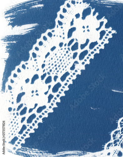 Cyanotype laces illustration. Handcrafted using traditional sun print techniques, featuring delicate and intricate lace textures in classic Prussian blue tones