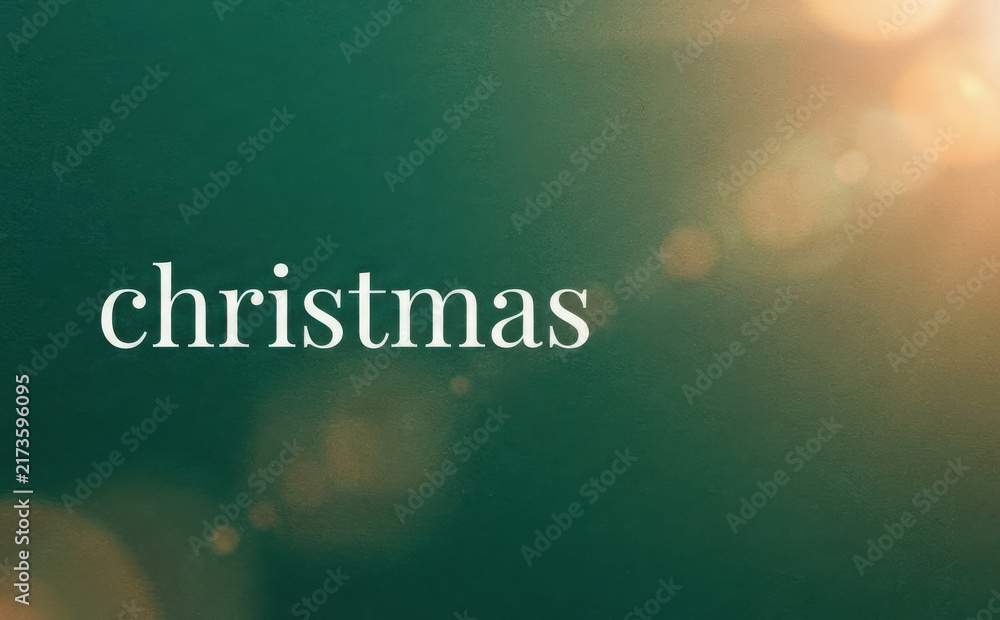 Fototapeta premium Christmas text on green background with light effects for seasonal holiday greeting card design