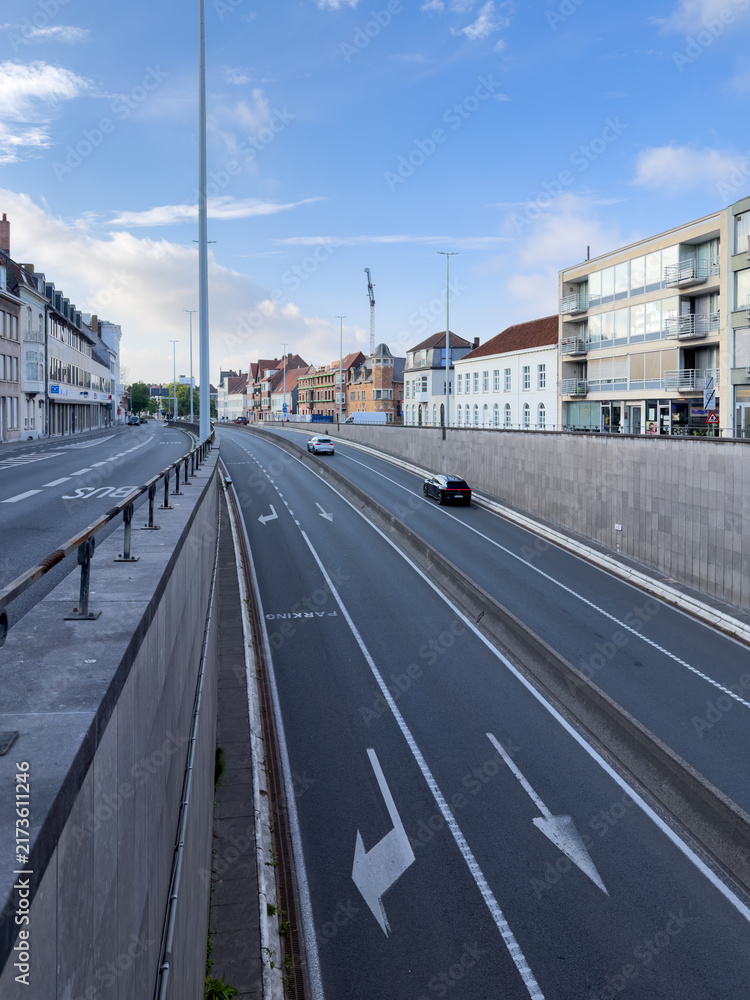 Naklejka premium Modern city avenue with road markings in Bruges Belgium