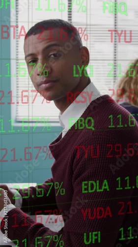 Animation of stock market data processing over man using smartphone smiling at office