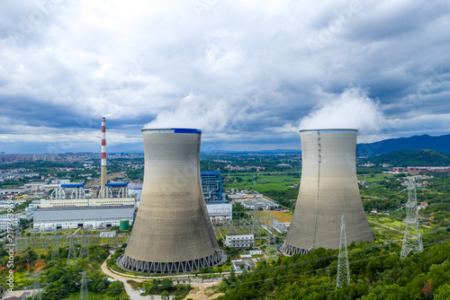 Canvastavla Aerial view of large thermal power plant with cooling towers under cloudy sky
