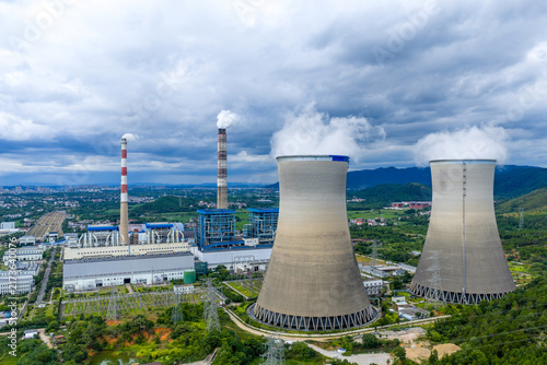 Canvastavla Aerial view of large thermal power plant with cooling towers under cloudy sky