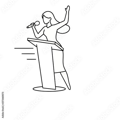 Woman speaking at a podium with a microphone