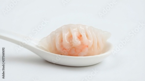 Single Dim Sum Shrimp Dumpling Har Gow Translucent Wrapper Showing Pink Shrimp Inside Pure White

