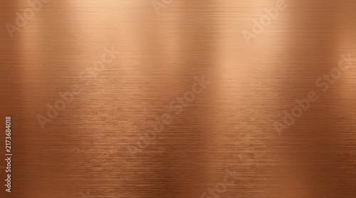 Abstract background of brushed copper metal texture with light reflections.