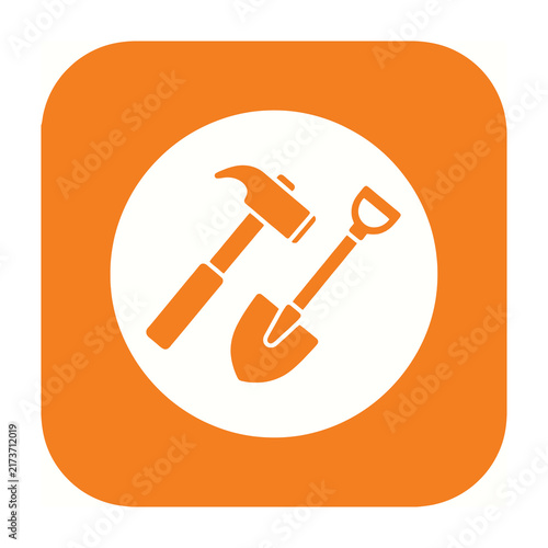 Orange icon with hammer and shovel tools