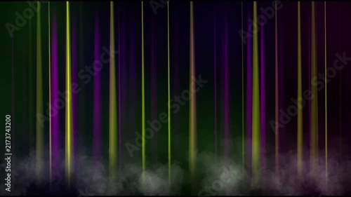 Colorful vertical light streaks with fog on black background