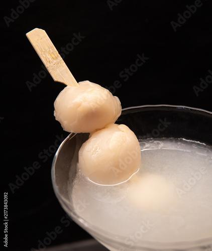 Elegant Dessert Skewer in Creamy Cocktail Glass.