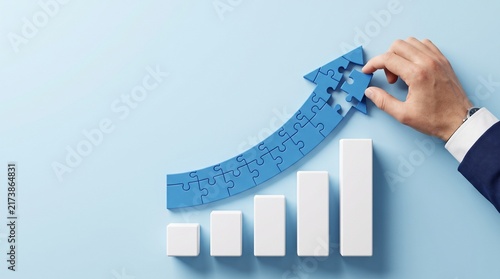 Business growth puzzle arrow with rising chart representing strategic expansion, performance improvement and scalable success