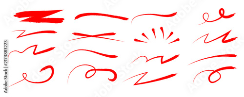 Various red marker brush strokes lines underlines and curly swirls isolated design elements with hand drawn
