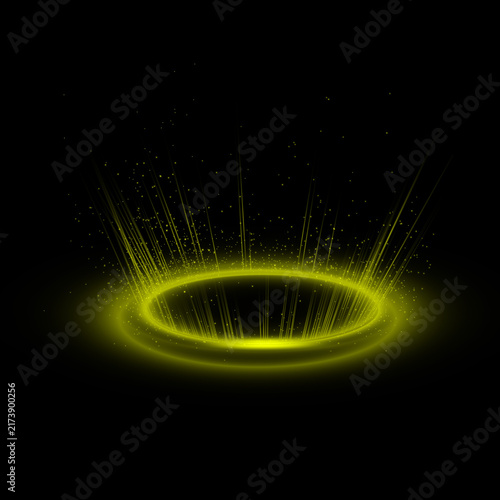 Glowing yellow circular portal with light particles isolated on a black background for fantasy design elements