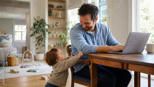 Obraz na płótnie Father working from home as toddler interrupts