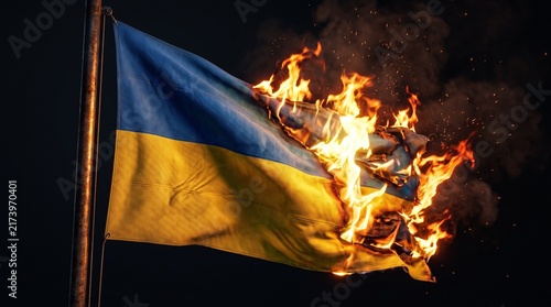 Ukraine's national flag is consumed by intense fire against a somber.