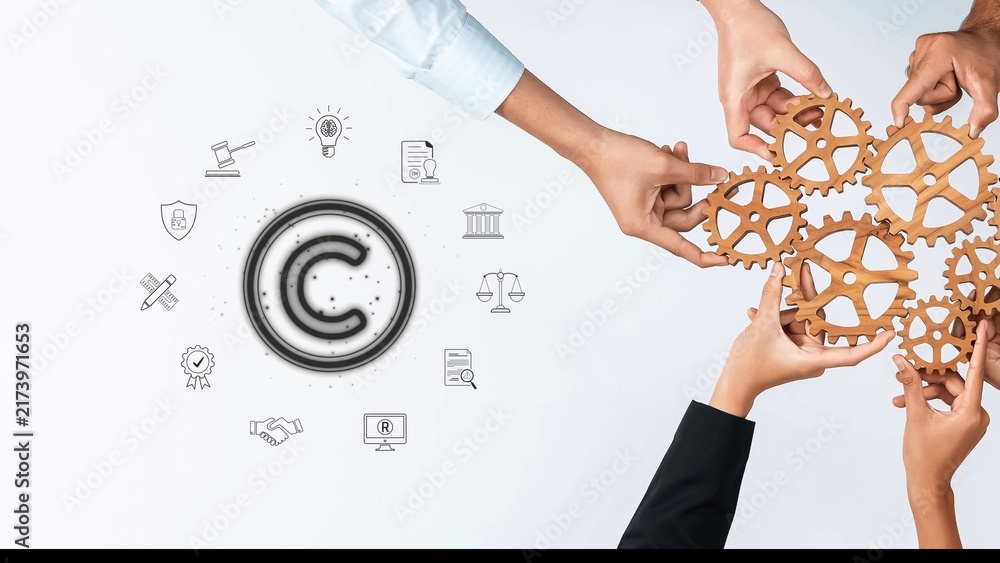 Obraz premium This image showcases diverse hands collaboratively working with wooden gears, symbolizing teamwork and innovation in a modern business context focused on creativity and growth. Raster