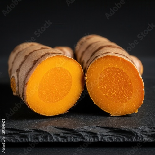 Vibrant Turmeric Root Sliced Open Revealing Golden Interior