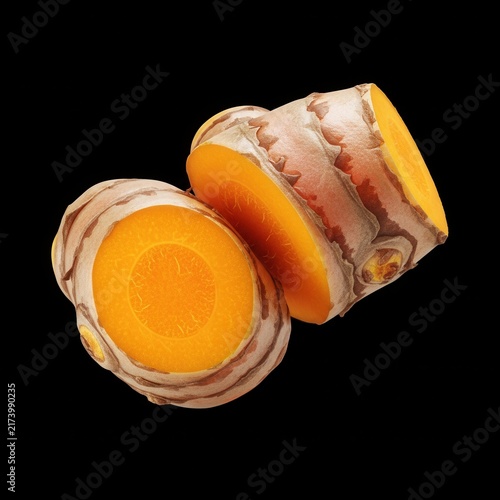 Vibrant Turmeric Root Slices Displayed With Their Intense Orange Core