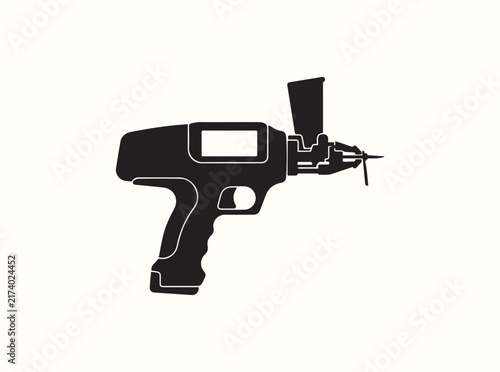 Black side silhouette of an automatic ear tag applicator for cattle on white