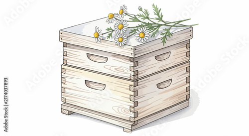Wooden beehive with chamomile flowers on top