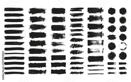 Grunge black paint brush strokes and ink smudge textures collection for artistic backgrounds and distressed graphic design elements.
