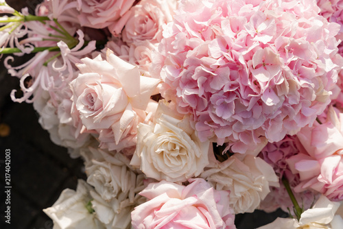 Close up of elegant bouquet with pink hydrangea and tender roses