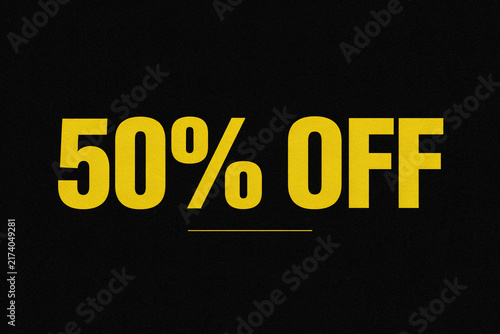 Bold yellow 50% OFF sale text on black background, discount promotion banner for retail marketing, ecommerce ads and social media