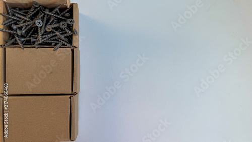 Obraz na plátne Two small identical cardboard boxes stacked on top of each other filled with ind