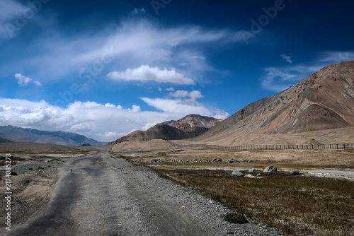 Scenic road view of Pamir Highway near Lake Karakul and Tajik-Chinese border, Tajikistan
