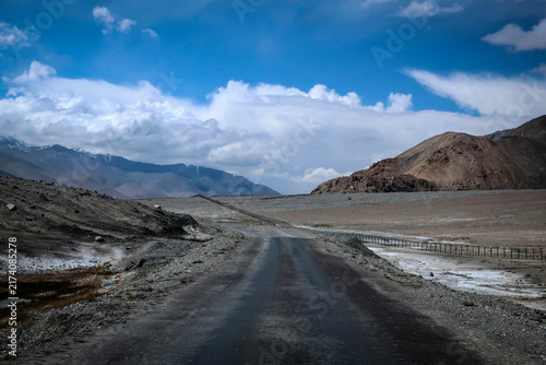 Scenic road view of Pamir Highway near Lake Karakul and Tajik-Chinese border, Tajikistan