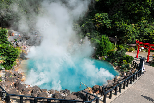 Aerial view of Umi Jigoku or Sea Hell hot springs by red torii gate, Beppu