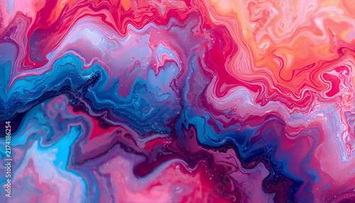 Abstract fluid art background showcases swirling waves of magenta, cyan, and orange paint.