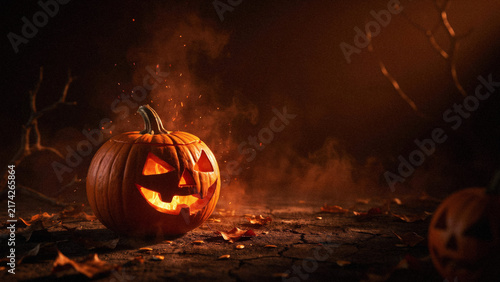 Cuadro en lienzo Glowing Halloween Jack-O-Lantern Concept - Pumpkin with Smoke and Sparks on Crac