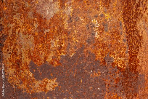 Foto Rust detail on an old metal barrel, image for industrial background