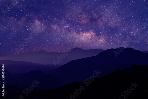 Beautiful night sky from milky way galaxy with stars and meteor over mountain