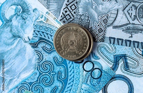 Konstfotografi Kazakhstani tenge money banknotes and coins on table