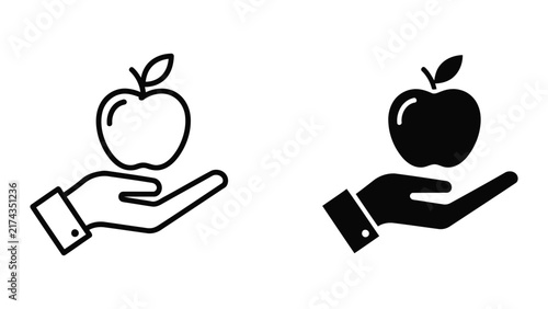Hand holding fresh organic apple representing healthy eating and fruit nutrition icon