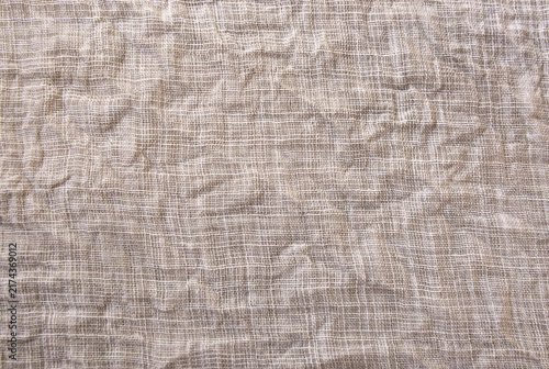 Slightly wrinkled linen fabric background