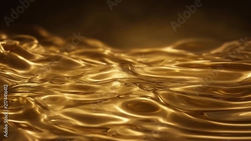Luxurious Liquid Gold Surface Moving in Smooth Viscous Waves