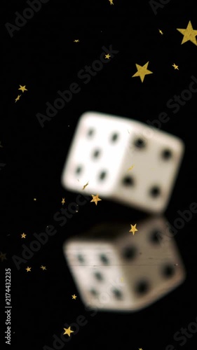 Animation of stars falling over dices