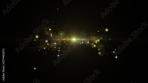 Принти на полотні Bright golden optical flare with bursting magic particles on black