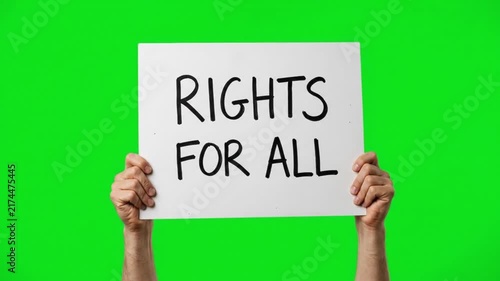 Hands holding banner sign with Rights For All message on green screen chroma key background