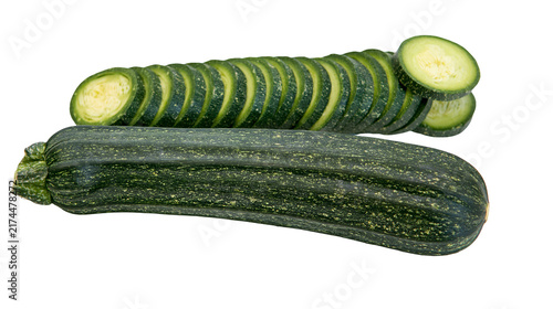 Photography Isolated fresh green zucchini, whole and precisely cut into uniform round slices
