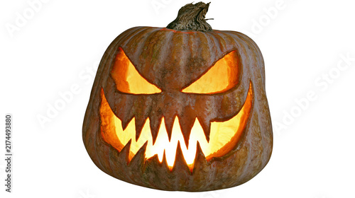 Obraz na plátně Isolated spooky glowing carved Halloween pumpkin with scary face for autumn holi