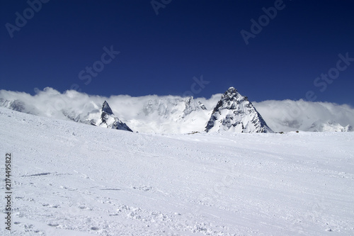 Ski slope at nice sun day