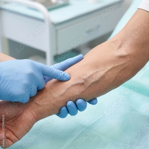 Medical Professional Demonstrating Vein Puncture Technique