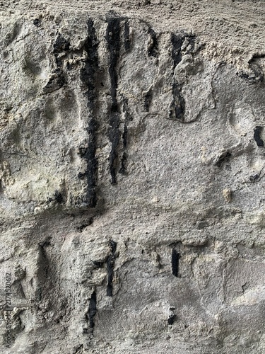 Konstfotografi old stone wall drippy texture grey gray black abstract background
