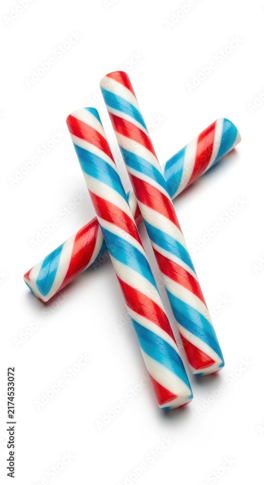 Obraz premium Colorful striped candy canes on white background.