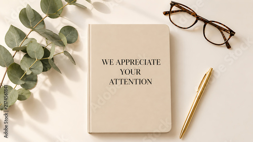A beige notebook with 