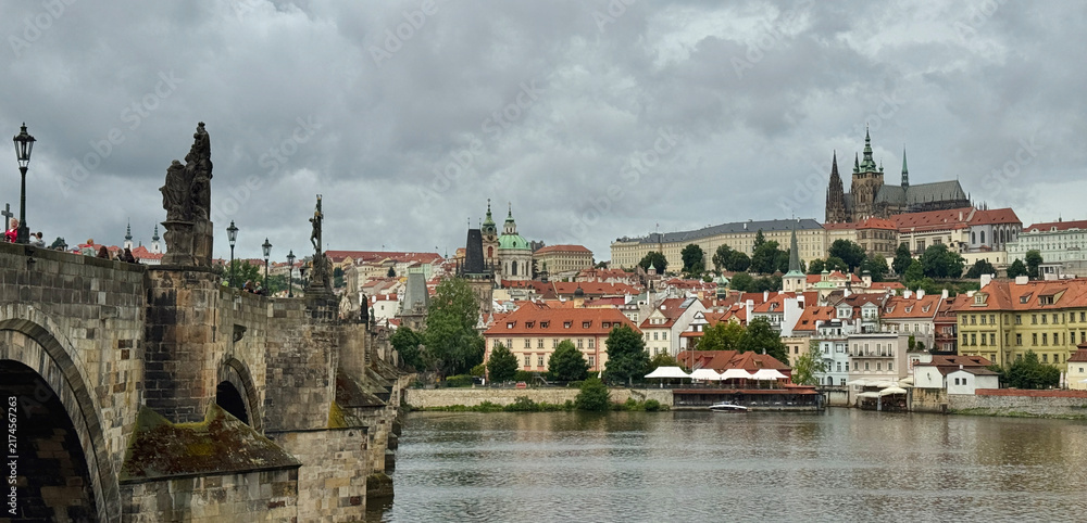 Fototapeta premium Landscape of Charles Bridge leading to Lesser Town and Prague Castle Complex in Czechia